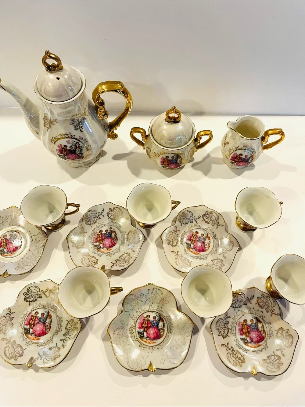 vintage porcelain tea service set from Japan features an iridescent finish